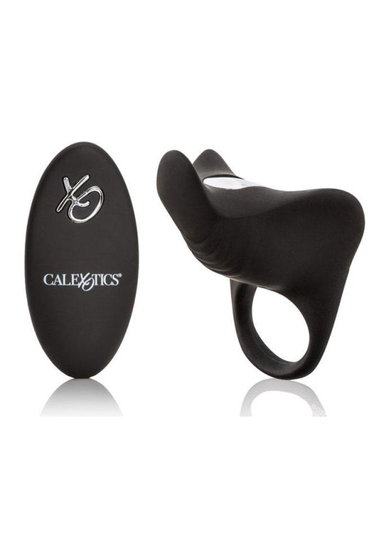 A black silicone couples vibrator ring with a remote control. The ring is sleek and has a smooth finish, while the remote is oval-shaped with a prominent brand logo.